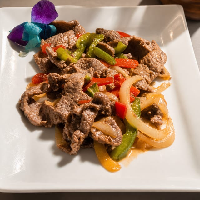 Bistec Salteado / Sautéed Steak.